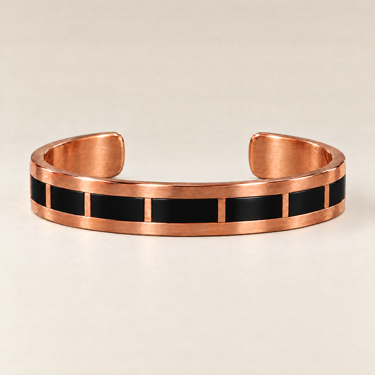 Wide Black Segment: front view showing black inlay segments divided by slim copper cross-bars
