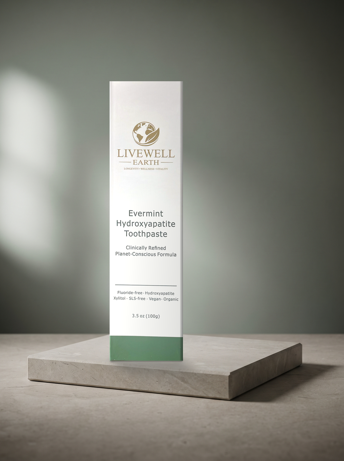 Evermint Hydroxyapatite Toothpaste carton on a stone plinth, 3.5 oz (100g), fluoride-free with xylitol