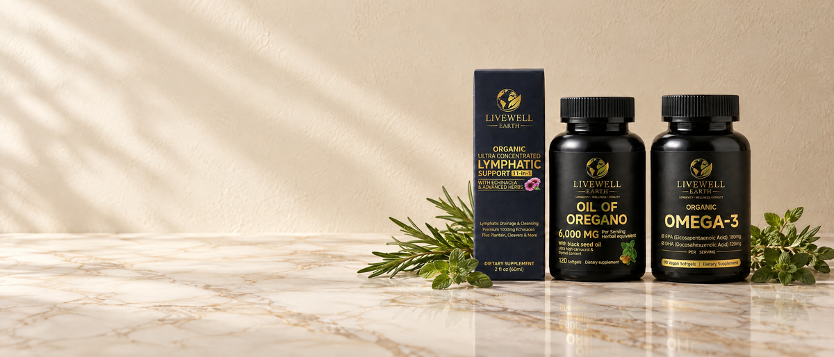 Lymphatic Support drops, Oil of Oregano and Omega-3 on a marble counter with rosemary and oregano