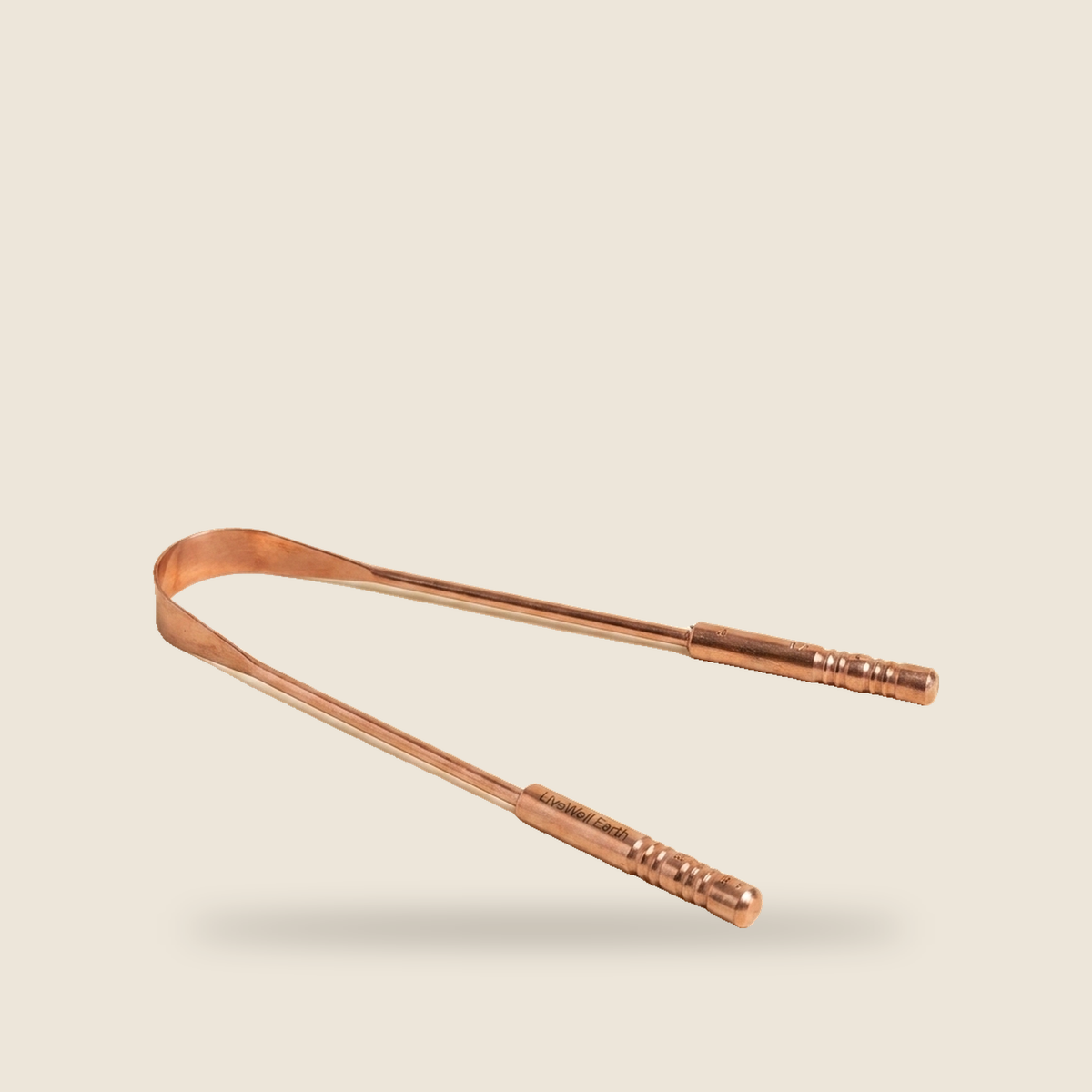 Longevity Copper Tongue Cleaner in solid copper, one of the three pieces in The Oral Care Trio